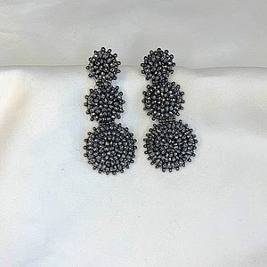 Earrings from various retailers. Jcrew, Ann Taylor, And Cache